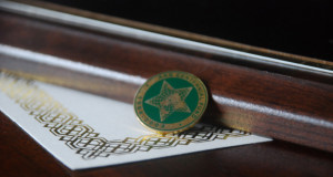 Image of AAG award pin and certificate