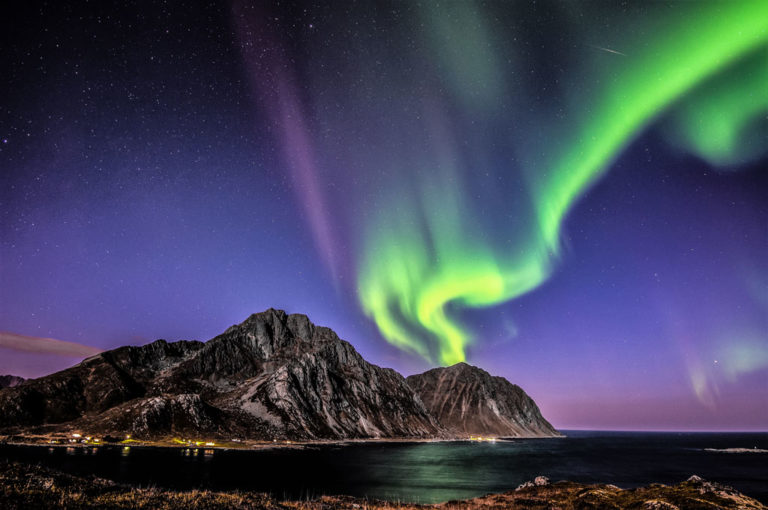 shutterstock_674896234 northern lights purple night sky mountain