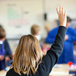 Raised Hand in Classroom