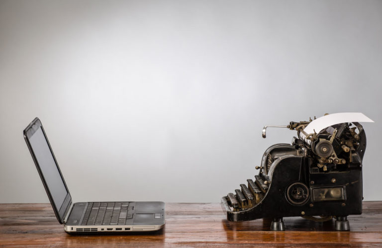 shutterstock_185325812 typewriter laptop