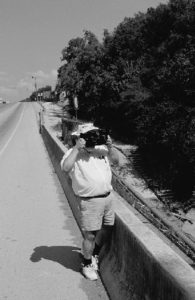 Ron Eyton with his self-built, stereographic multi-spectral camera system photographing flood damage on the Guadalupe River in 2002