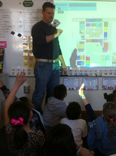Photo of Chuck Powell instructing a class
