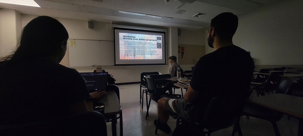 Attendees listen to a streamed session during the California State University, Fullerton AAG 2023 node events.