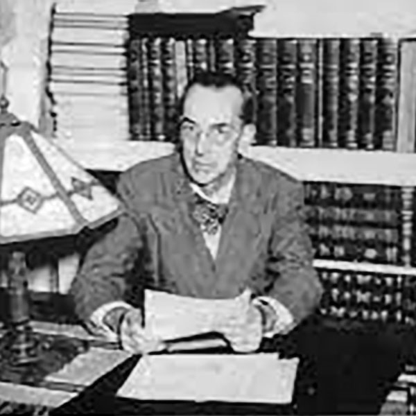 Photo of Oliver Baker at his desk