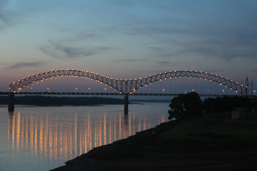 Photograph entitled "Volunteer Bridge" by Tyre Nichols; the image shows the Hernando De Soto Bridge lit up in the evening in Memphis, Tennessee