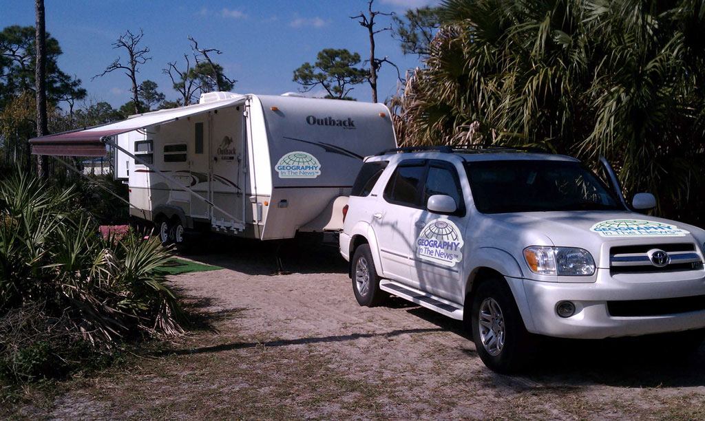 Neal Lineback's SUV and RV displaying Geography in the News logos