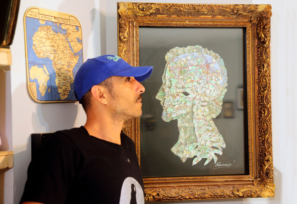 Joanathan Bessaci poses showing his profile facing his artistic rendering of a profile. Courtesy: Joanathan Bessaci