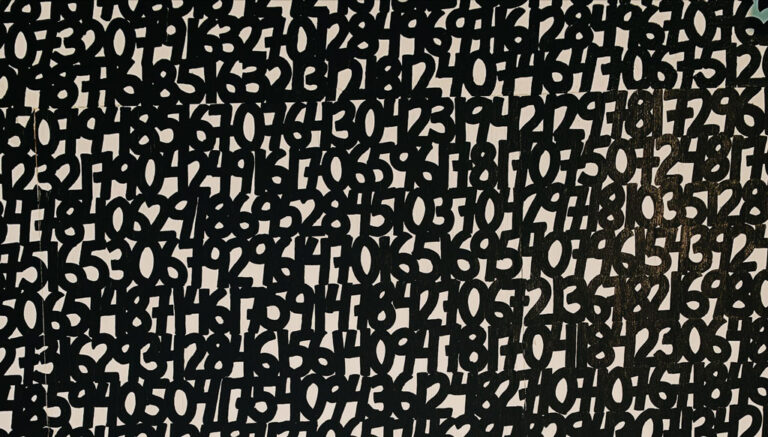Jumble of white numbers on a black background