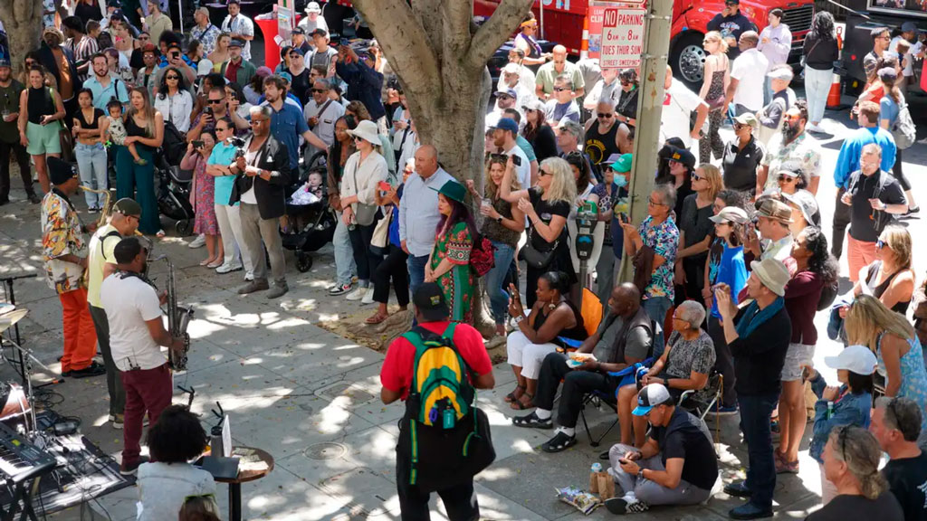 Photo showing an overhead view of musicians playing to a packed crowd at the Fillmore Jazz Festival. Credit: Fillmore Jazz Festival