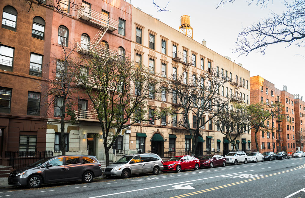 Generic Manhattan uptown Upper West Side street lined with residential buildings in New York City